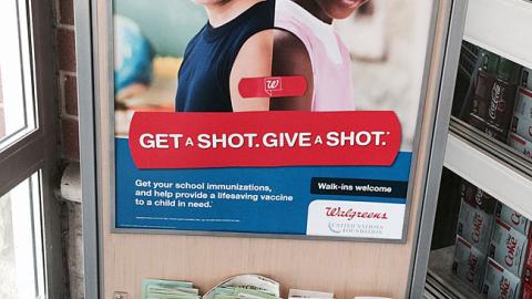 Walgreens 'Get a Shot. Give a Shot' Stanchion Sign