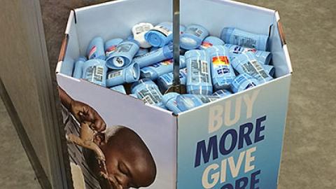 Unilever Walgreens 'Give H2OPE' Dump Bin