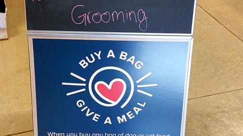 PetSmart 'Buy a Bag, Give a Meal' A-Board