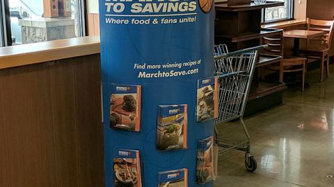 QFC 'March to Savings' Standee