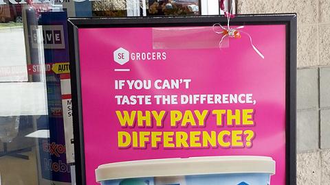 SE Grocers 'Why Pay the Difference?' Stanchion Sign
