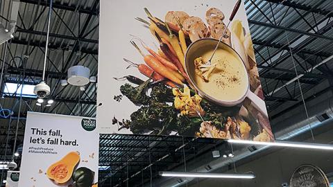 Whole Foods 'Huddle Up' Ceiling Sign