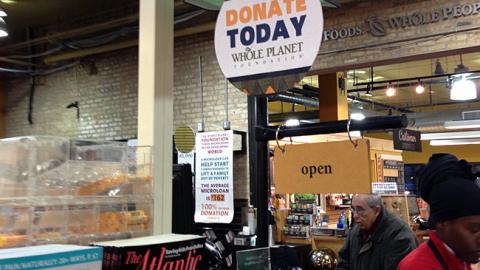 Whole Foods 'Whole Planet' Checkout Sign
